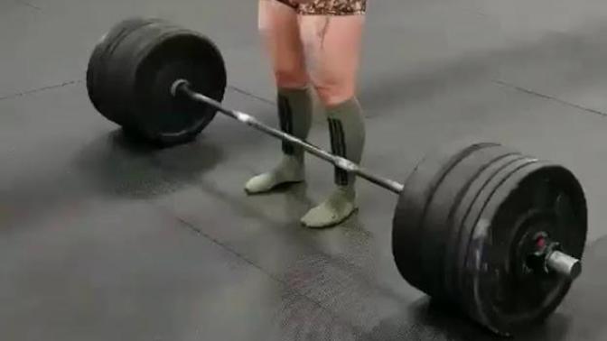 [Pic] When someone lifts weights and after awhile her arms start to hang slightly more bent at the elbow, is that a sign of muscle development?