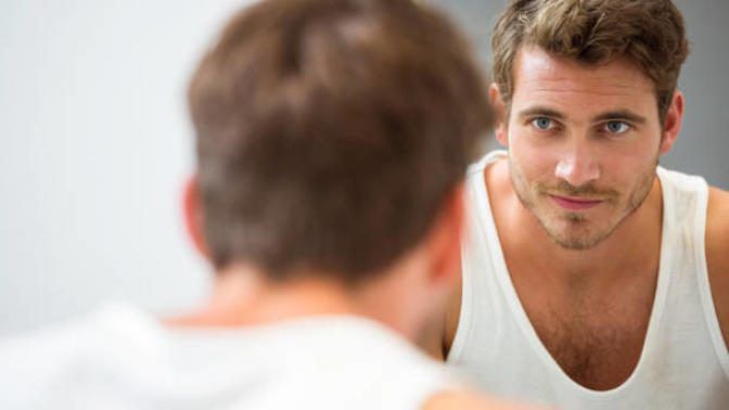 How can a guy accurately judge his own looks?
