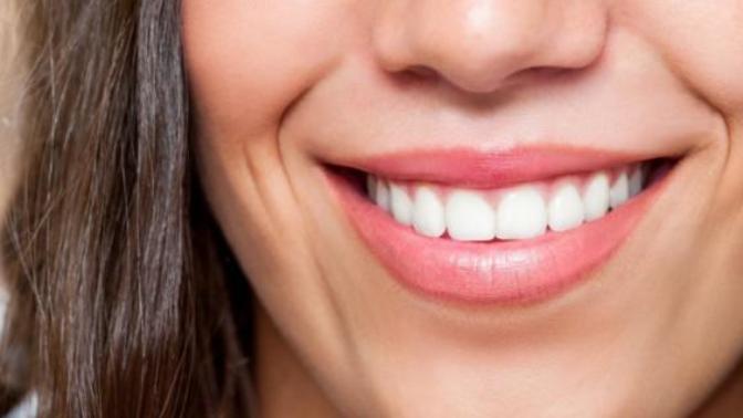 How do you smile correctly for pictures?