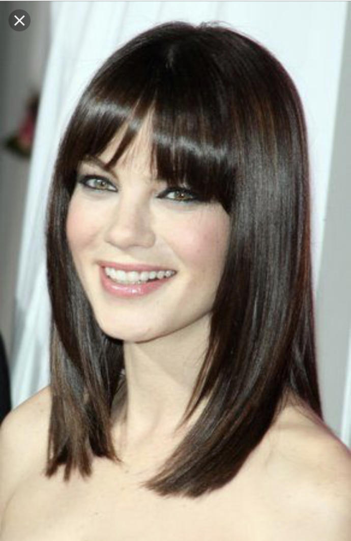 Is a girl deceiving people if she's always straightening her hair and bangs because she doesn't like her super curly Hair and forehead?