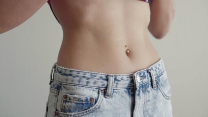 Why do some guys like a girl's tummy?