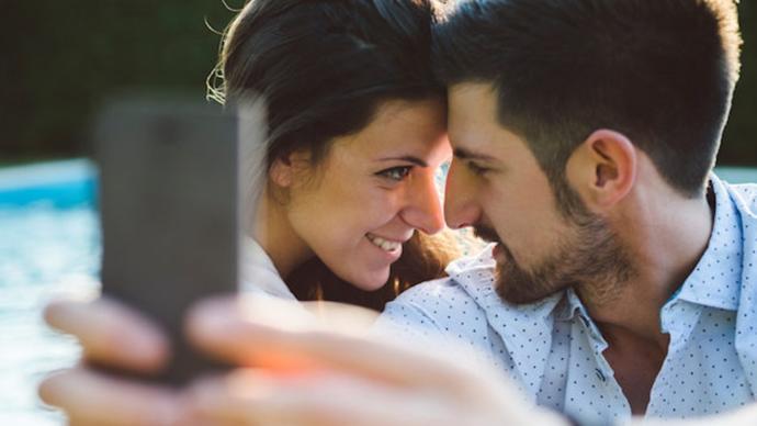 Why do women brag about their relationship on social media?