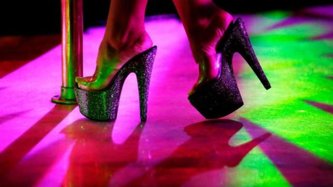 Why would someone go to a strip club while in a relationship?