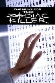 Hand covering the Zodiacs z340 cipher.