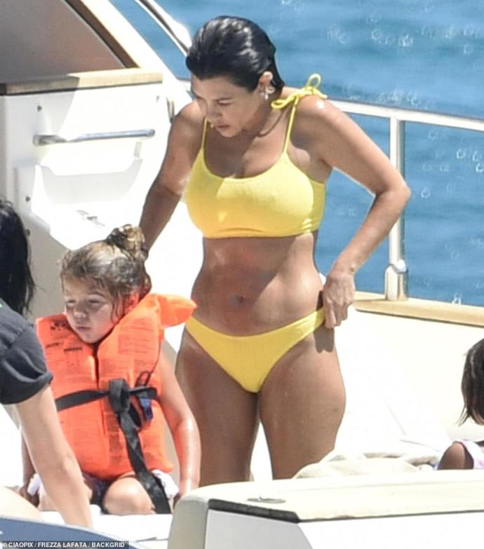 Is it OK for a mom to wear this kind of bikini in front of her kids?