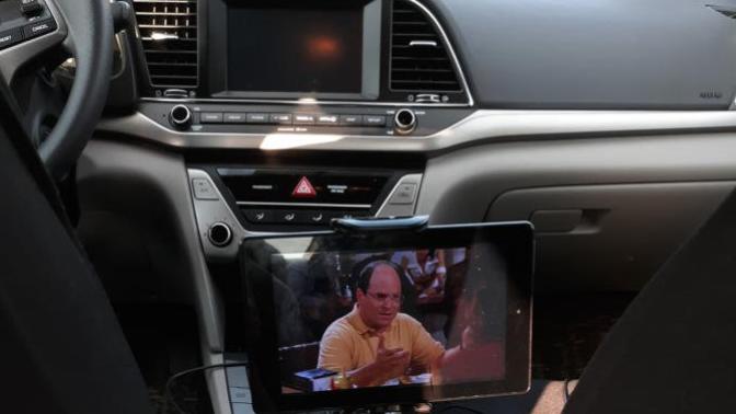 Are you jealous of my TV entertainment system in my car?