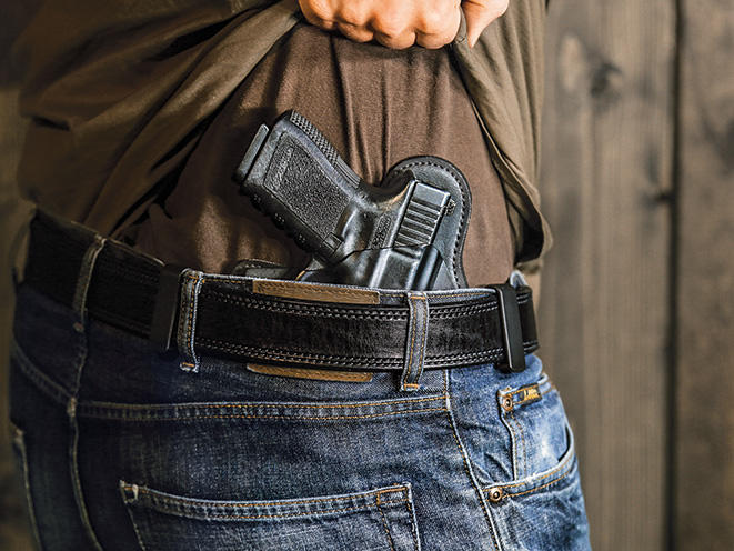 How would you react if you found out that the person you're dating carries a gun and owns firearms?