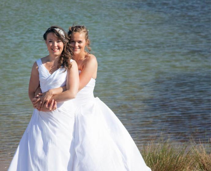 How do lesbians decide who will have the child when they want a baby through Artificial Insemination?