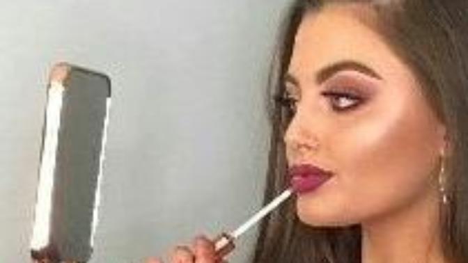All a girl needs is some lipstick, lip gloss to get into the zone and its party time. How good do I look?