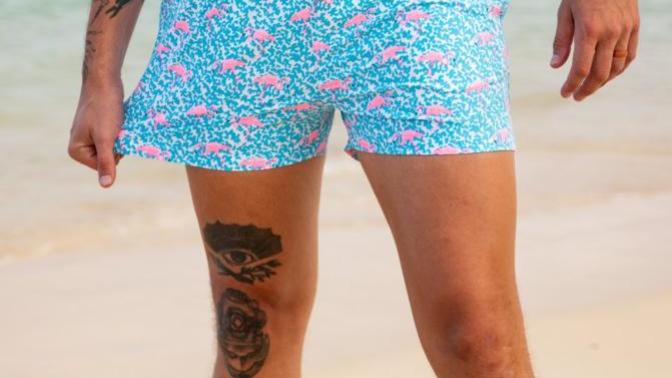 Do you prefer men in shorter swimming trunks or longer swimming trunks?