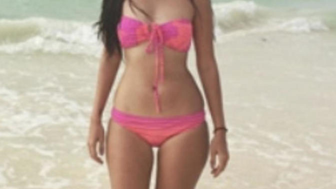 Hoe much weight do I have to lose to look like her? And is she skinny?