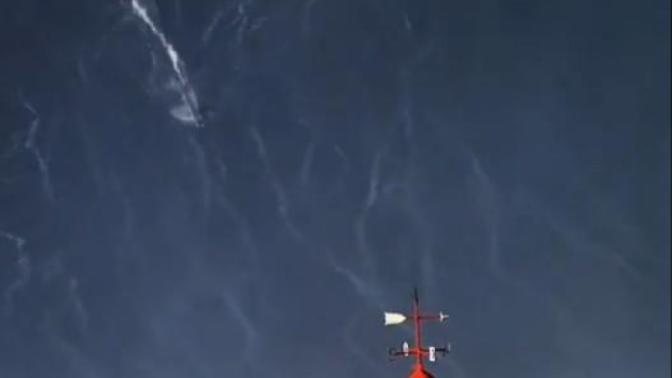 Would you surf OR be a spectator of these monstrous waves in Nazare, Portugal?