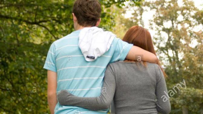 Girls, would you be mad if your boyfriend let his female friend sit on his lap and he put his arm around her like this?