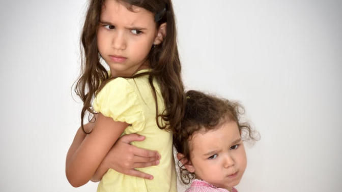 How to deal with a daughter who bullies your youngest daughter?