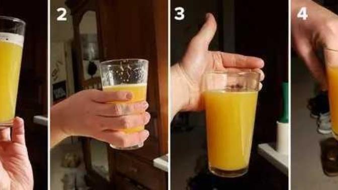 Which is the worst way to hold a glass?