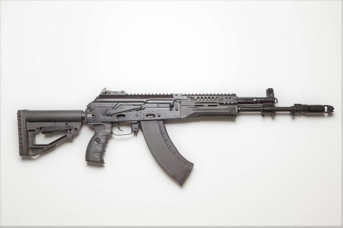 You are in a gunfight with heavily armed members of the drug cartel in Mexico.  If you can only pick one which weapon would you choose?