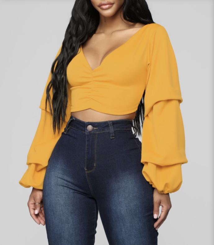Which top looks cute enough to wear to a date at the fair ?