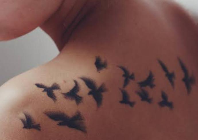 Which type of design for dolphin tattoo??