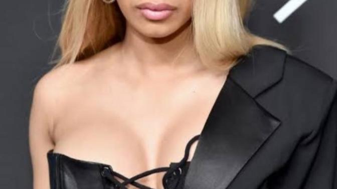 Why do popular black celebrities in the west look white washed?