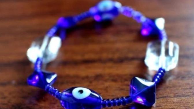 Is it bad luck to buy an evil eye accessory and keep it for myself?