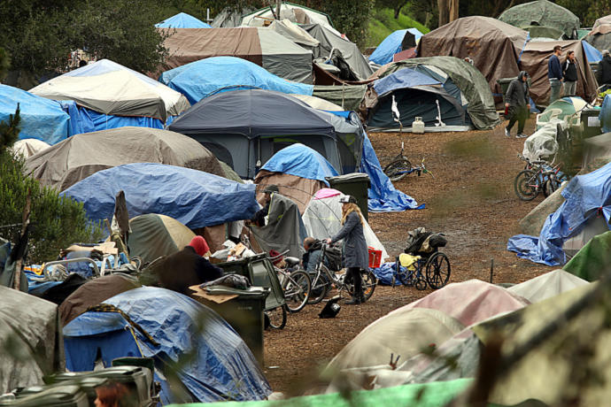 Do you have any reasons you would not give some homeless person with a sign asking for help a few dollars?