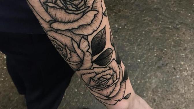 Girls, Which of those 2 tattoo look better on a man?