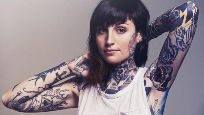 Why are tattoos on males a turn on for women, but tattoos on females are a turn off for men?