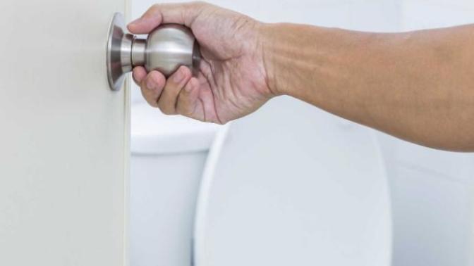 Is it fine for a partner to use the toilet with the door open?
