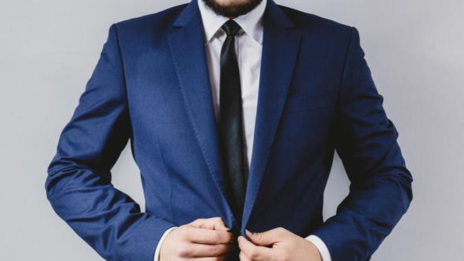 Girls, What is one piece of clothing that never fails to make a guy look good (not flannel) ?