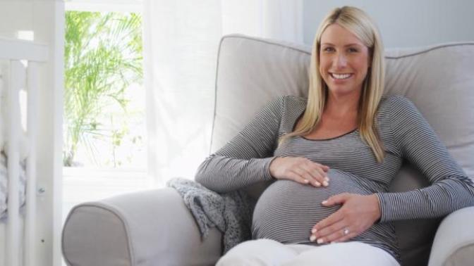 Why do pregnant girls rub their bellies?