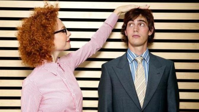 How tall do you have to be to get a hot girlfriend?