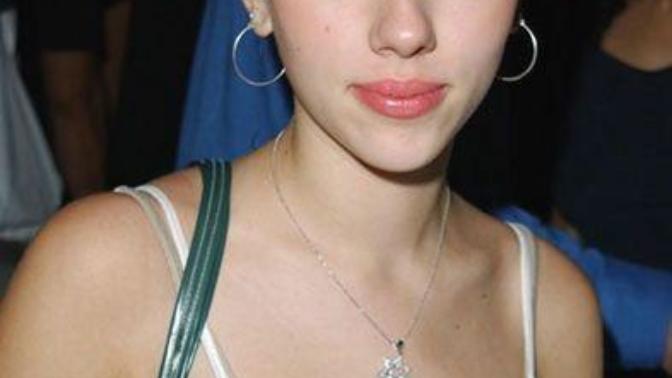 Did Scarlett johansson get breast implants? and then got them removed?