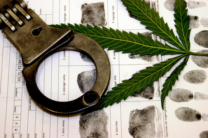 Would legalizing drugs help or hinder the drug use in society?