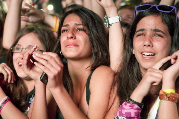 Why do girls cry so much while watching a movie or theatrical play? ... do guys cry too?