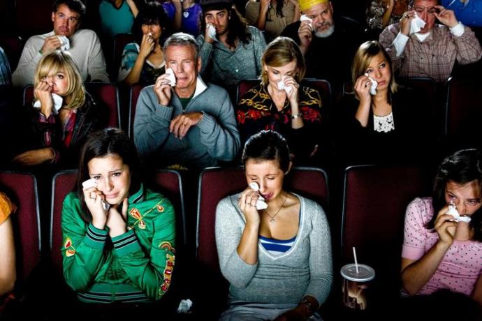 Why do girls cry so much while watching a movie or theatrical play? ... do guys cry too?