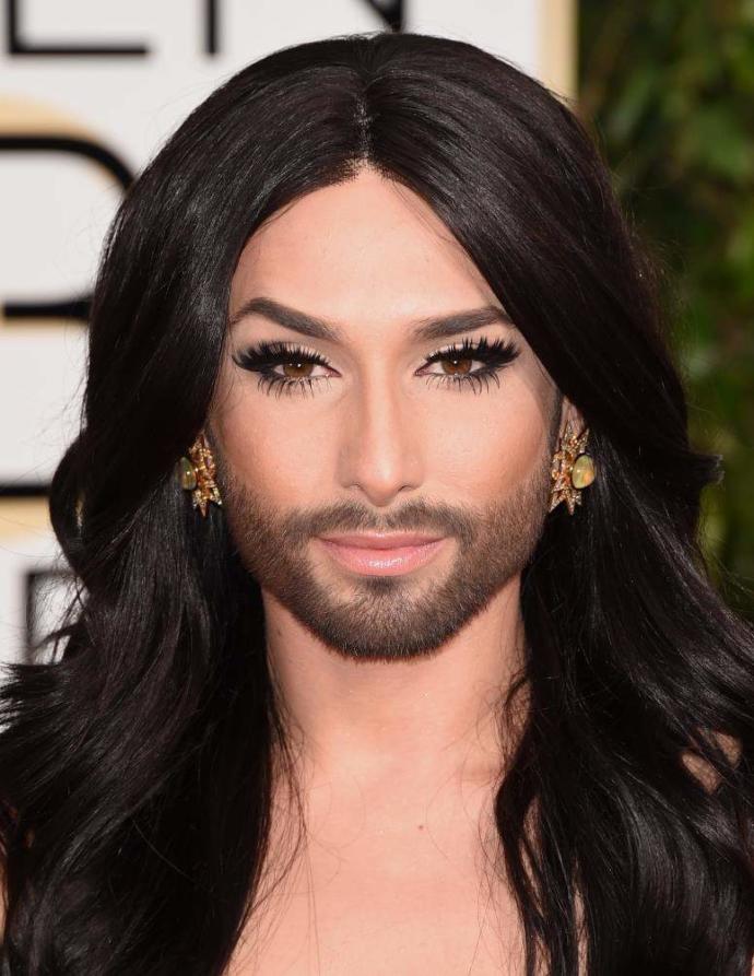 With long hair, makeup and dress