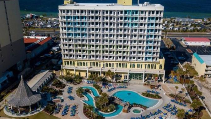 Would you rather stay at a all-inclusive resort or a large beach front hotel?