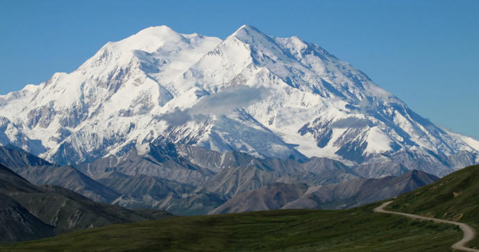 Would it be more impressive to climb the highest or tallest mountain in the world?