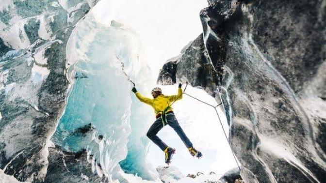 Would it be more impressive to climb the highest or tallest mountain in the world?