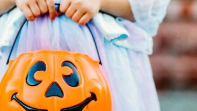 To Christians and non-christians, should Christians participate in trick or treat or as a stance against satanic rituals refuse?