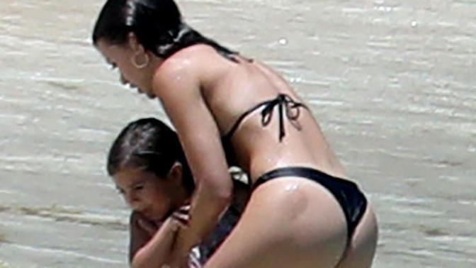 What do you think of mothers who wear super revealing swimsuits near their kids?