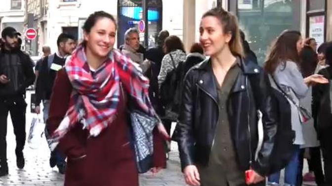 Which girl has a better clothing style?
