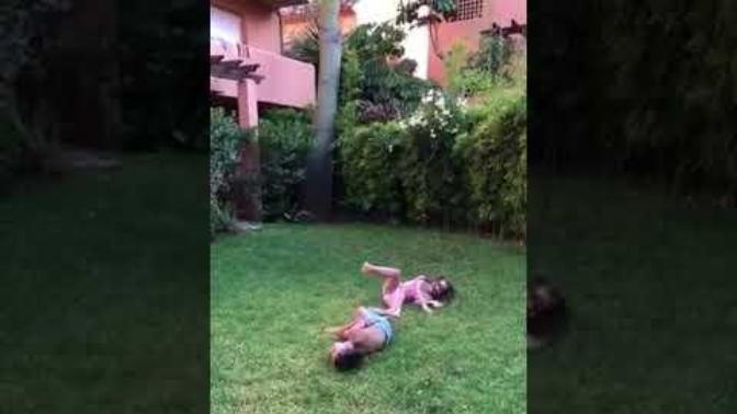 Why does the mother in this video laugh, when her son gets kneed in the balls by her daughter (who, by the looks of it, did it on purpose)?