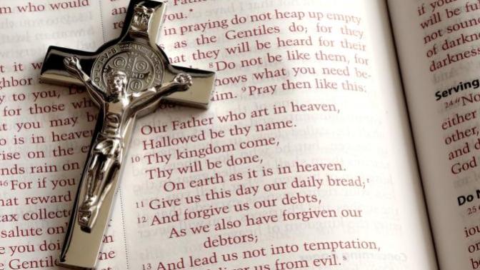 Simply explain to a non-Christian the difference between a Catholic and a Protestant?