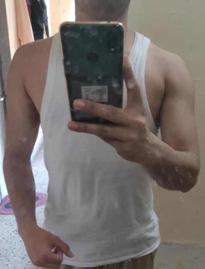 Who looks better in terms of body, me or my roommate (friend) (pics are in the description)?
