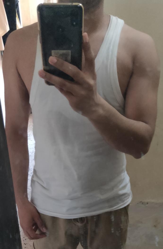 Who looks better in terms of body, me or my roommate (friend) (pics are in the description)?