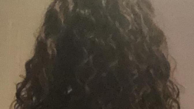How do I grow out naturally curly hair?