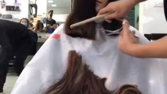 How come girls look attractive and hot even when they are caped and getting haircut or styled?