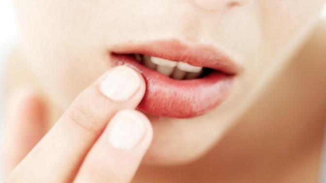 Why did my male co worker watch me when I applied lip balm?