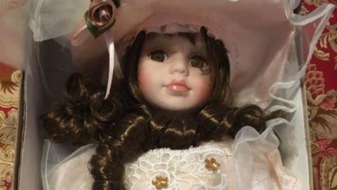 Why do most dolls have curly hair?